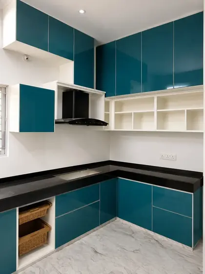 Teal Glossy Modular Kitchen, completed by Lucky Enterprises